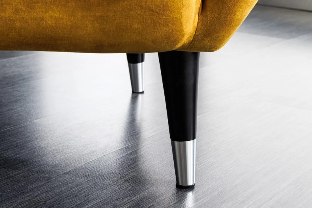 Chesterfield armchair mustard yellow / black / silver wing chair from Casa Padrino